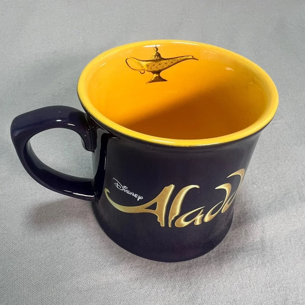 Disney Aladdin Broadway Musical‎ Coffee Mug Purple Yellow Genie Lamp Inside